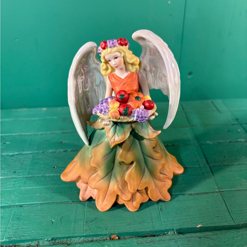 Avon Holiday Angel Figurine with Orange and Green Dress